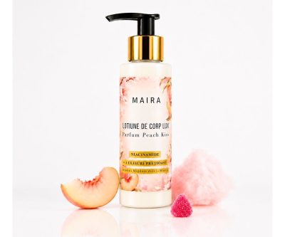 Loțiune de corp Lux cu Niacinamide pentru hidratarea pielii, varianta Peach Kiss, în recipient de 100 ml cu pompiță.